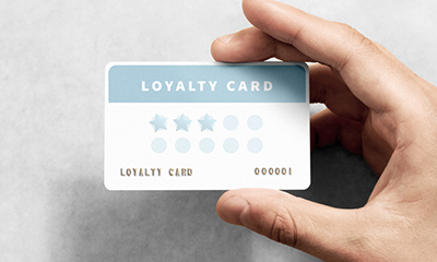 hand holding generic store loyalty card