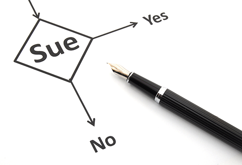 A writing pen pointing to the word Sue with two options, yes or no